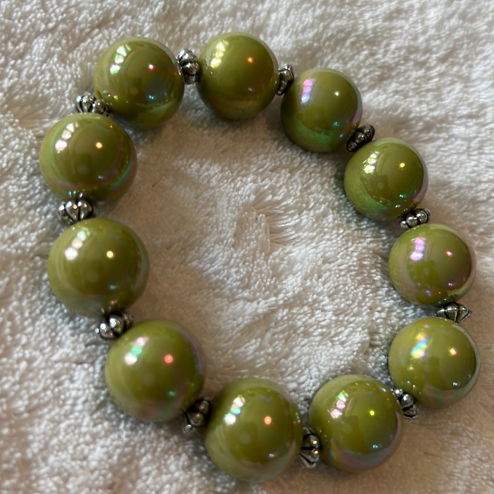Garold Miller stretch bracelet. Incandescent olive green